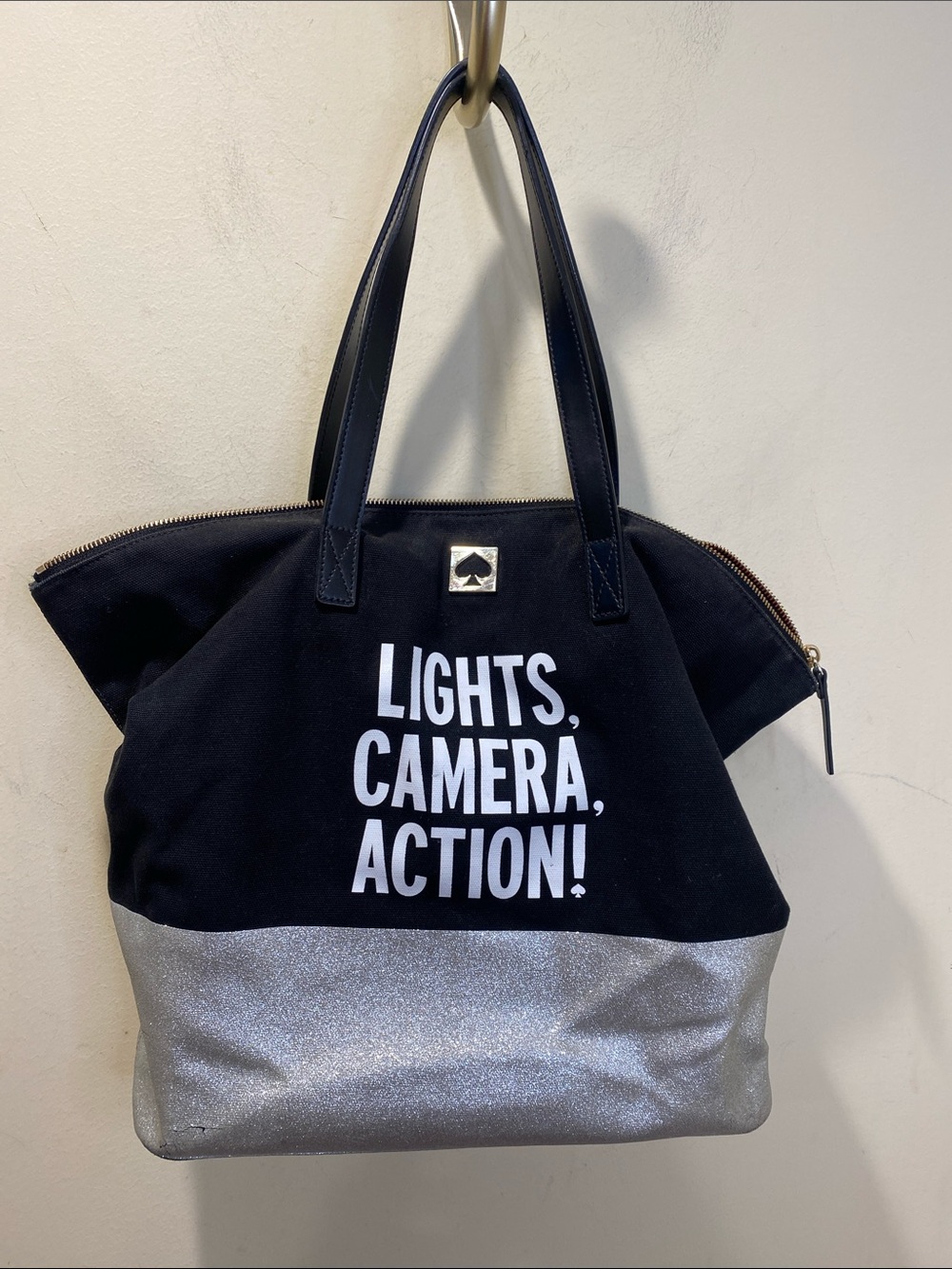kate spade Lights Camara Accion Black Canvas Tote with Silver Accent and Slogan